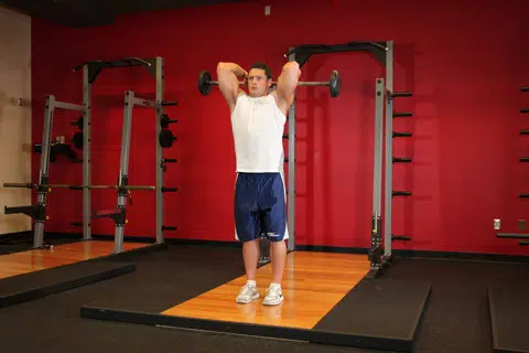 Correct form for Standing Overhead Barbell Triceps Extension