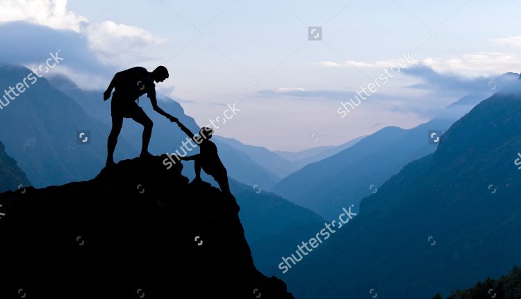 stock-photo-teamwork-couple-helping-hand-trust-assistance-silhouette-in-mountains-sunset-team-of-climbers-man-279435734